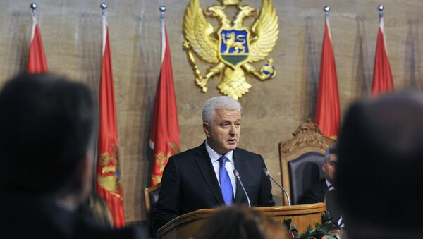 The newly elected Montenegrin Prime Minister Dusko Markovic (C) delivers a speech during a ceremony at the Montenegro Parliament in Podgorica - Sputnik International