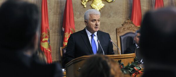 The newly elected Montenegrin Prime Minister Dusko Markovic (C) delivers a speech during a ceremony at the Montenegro Parliament in Podgorica - Sputnik International