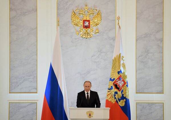 December 3, 2015. Russian President Vladimir Putin delivers his annual Presidential Address to the Federal Assembly at the Kremlin's St. George Hall. - Sputnik International