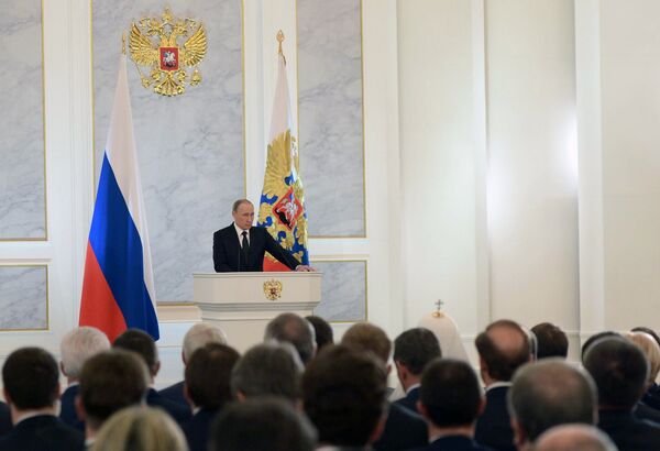 December 3, 2015. Russian President Vladimir Putin delivers his annual Presidential Address to the Federal Assembly at the Kremlin's St. George Hall. - Sputnik International