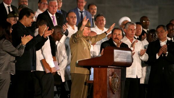 Cuban President Raul Castro acknowledges the applause from the crowd as he attends a massive tribute to Cuba's late President Fidel Castro in Revolution Square in Havana, Cuba, November 29, 2016. - Sputnik International