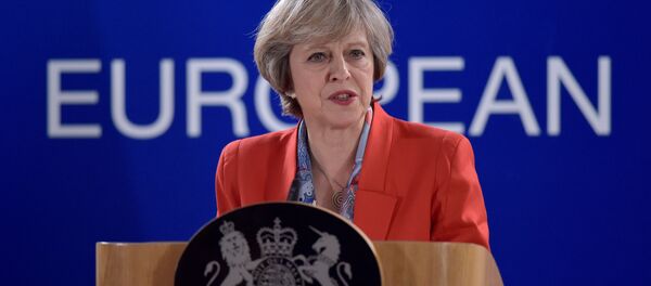 Britain's Prime Minister Theresa May holds a news conference after the EU summit in Brussels, Belgium October 21, 2016. Britain's Prime Minister Theresa May holds a news conference after the EU summit in Brussels, Belgium October 21, 2016. - Sputnik International