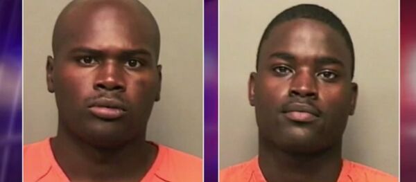 Charles Robsin, Left, Jamal Williams-McCray, right Charles Robsin, Left, Jamal Williams-McCray, right - Sputnik International