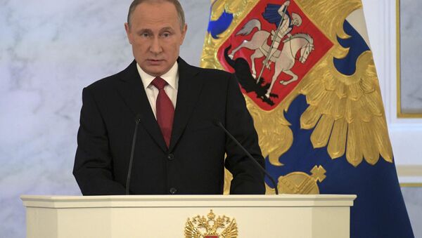 Russian President Vladimir Putin delivers a speech during his annual state of the nation address at the Kremlin in Moscow, Russia, December 1, 2016 - Sputnik International