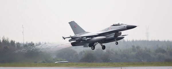 One of the seven Danish F-16 fighter jets takes off from military airport Flyvestation Skrydstrup in Jutland, Denmark (File) - Sputnik International