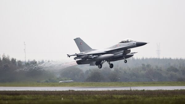 One of the seven Danish F-16 fighter jets takes off from military airport Flyvestation Skrydstrup in Jutland, Denmark (File) - Sputnik International