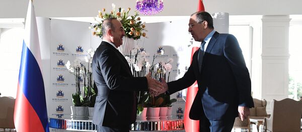 Russian Foreign Minister Sergei Lavrov, right, and Turkish Foreign Minister Mevlut Cavusoglu meet in Turkey Russian Foreign Minister Sergei Lavrov, right, and Turkish Foreign Minister Mevlut Cavusoglu meet in Turkey - Sputnik International