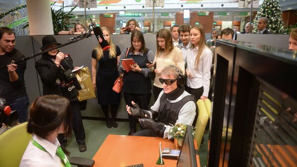 Herman Gref, center, president and Chairman of Executive Board at Sberbank of Russia, during the launch of a project to adapt the bank's services and products to physically challenged people - Sputnik International