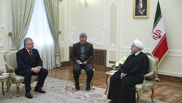 In this photo released by an official website of the office of the Iranian Presidency, Iran's President Hassan Rouhani, right, meets with Russian Deputy Foreign Minister and Russia's special envoy on Syria Alexander Lavrentiev, left, at his office, in Tehran, Iran, Saturday, Dec. 3, 2016 - Sputnik International