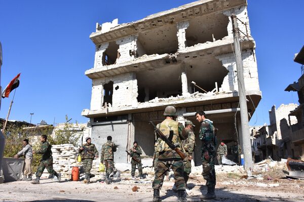 Syrian pro-government forces gather in the Myessar district in east Aleppo in an ongoing operation to recapture all of the battered second city, on December 4, 2016 Syrian pro-government forces gather in the Myessar district in east Aleppo in an ongoing operation to recapture all of the battered second city, on December 4, 2016 - Sputnik International