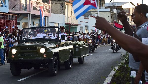 The urn with the ashes of Cuban leader Fidel Castro leaves Revolution Square in Santiago, Cuba on December 4, 2016 on its way to the cemetery - Sputnik International