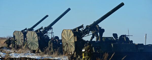 Russian Federation Armed Forces serviceman by a self-propelled 240 mm mortar Tyulpan during the exercise of missile and artillery units of the fifth army of Eastern Military District in Primorski Krai Russian Federation Armed Forces serviceman by a self-propelled 240 mm mortar Tyulpan during the exercise of missile and artillery units of the fifth army of Eastern Military District in Primorski Krai - Sputnik International