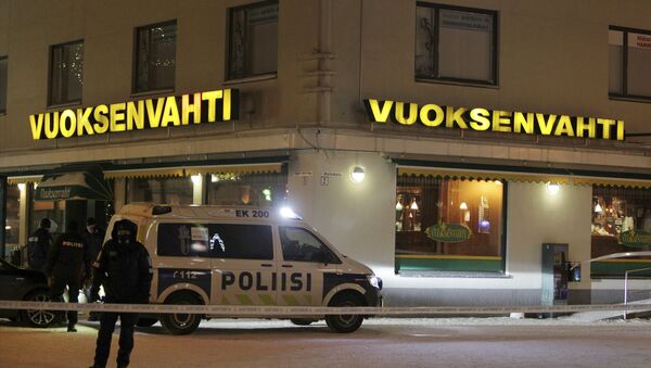 Police guards the area were three people were killed in a shooting incident at a restaurant in Imatra, Eastern Finland after midnight on December 4, 2016 - Sputnik International
