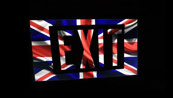 A screen grab shows the British flag with an exit sign superimposed on October 19, 2016 in Paris. - Sputnik International
