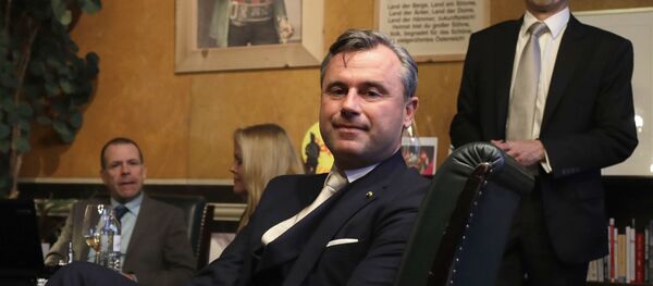 Norbert Hofer, center, candidate of the right-wing populist Freedom Party, poses for a photograph as he and his aides wait in his office in Austria's capital Vienna before the voting closes Sunday, Dec. 4, 2016 Norbert Hofer, center, candidate of the right-wing populist Freedom Party, poses for a photograph as he and his aides wait in his office in Austria's capital Vienna before the voting closes Sunday, Dec. 4, 2016 - Sputnik International