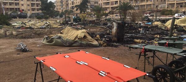 Militants shelled a mobile Russian hospital in Aleppo, killing a female paramedic and wounding two doctors. Militants shelled a mobile Russian hospital in Aleppo, killing a female paramedic and wounding two doctors. - Sputnik International