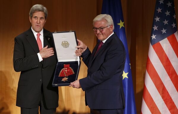 Outgoing U.S. Secretary of State John Kerry receives the Grand Cross, First Class of the order of Merit of the Federal Republic of Germany from German Foreign Minister Frank-Walter Steinmeier (R) at the Foreign Ministry in Berlin, Germany, December 5, 2016. Outgoing U.S. Secretary of State John Kerry receives the Grand Cross, First Class of the order of Merit of the Federal Republic of Germany from German Foreign Minister Frank-Walter Steinmeier (R) at the Foreign Ministry in Berlin, Germany, December 5, 2016. - Sputnik International