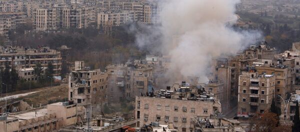 Smoke rises near Bustan al-Qasr crossing point in a government controlled area, during clashes with rebels in Aleppo, Syria December 5, 2016. Smoke rises near Bustan al-Qasr crossing point in a government controlled area, during clashes with rebels in Aleppo, Syria December 5, 2016. - Sputnik International