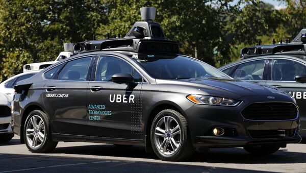 A group of self driving Uber vehicles position themselves to take journalists on rides during a media preview at Uber's Advanced Technologies Center in Pittsburgh, Monday, Sept. 12, 2016. - Sputnik International