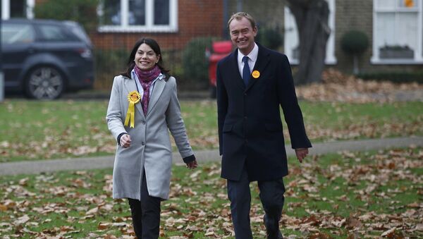 Liberal Democrats winner of the Richmond Park by-election, Sarah Olney, arrives to celebrate her victory with party leader Tim Farron (R) on Richmond Green in London, Britain December 2, 2016. - Sputnik International