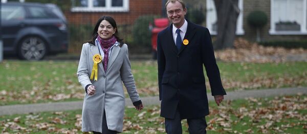 Liberal Democrats winner of the Richmond Park by-election, Sarah Olney, arrives to celebrate her victory with party leader Tim Farron (R) on Richmond Green in London, Britain December 2, 2016. Liberal Democrats winner of the Richmond Park by-election, Sarah Olney, arrives to celebrate her victory with party leader Tim Farron (R) on Richmond Green in London, Britain December 2, 2016. - Sputnik International