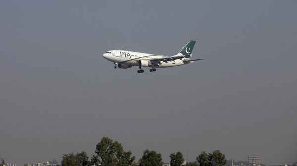A Pakistan International Airlines (PIA) passenger plane arrives at the Benazir International airport in Islamabad, Pakistan. (File) - Sputnik International