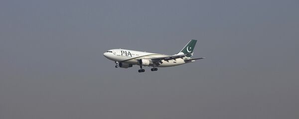 A Pakistan International Airlines (PIA) passenger plane arrives at the Benazir International airport in Islamabad, Pakistan. (File) A Pakistan International Airlines (PIA) passenger plane arrives at the Benazir International airport in Islamabad, Pakistan. (File) - Sputnik International