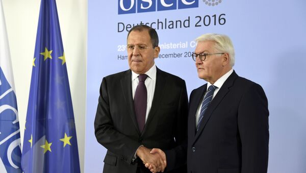 German Foreign Minister Frank-Walter Steinmeier (R) welcomes his Russian counterpart Sergey Lavrov at the 23rd OSCE Ministerial Council organized by Germany's OSCE Chairmanship in Hamburg, Germany December 8, 2016 - Sputnik International