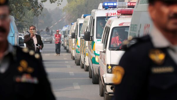 Coffins containing the remains of victims of the Pakistan International Airlines (PIA) plane crash arrive at PIMS hospital by ambulance in Islamabad, Pakistan December 8, 2016. - Sputnik International