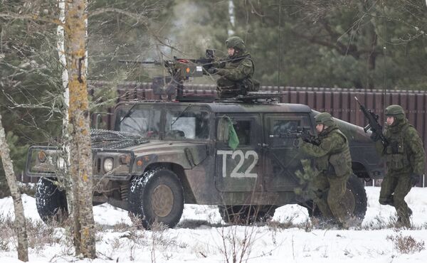 Soldiers take part in the NATO military exercise 'Iron Sword 2016' at a training range in Pabrade, north of the capital Vilnius, Lithuania on Friday, Dec. 2, 2016. The US and NATO have beefed up their presence throughout Eastern Europe significantly over the past two years following the outbreak of the crisis in Ukraine. Soldiers take part in the NATO military exercise 'Iron Sword 2016' at a training range in Pabrade, north of the capital Vilnius, Lithuania on Friday, Dec. 2, 2016. The US and NATO have beefed up their presence throughout Eastern Europe significantly over the past two years following the outbreak of the crisis in Ukraine. - Sputnik International
