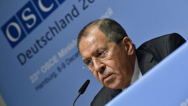 Russia's Foreign Minister Sergei Lavrov addresses a press conference during the foreign ministers' meeting of the Organisation for Security and Cooperation in Europe (OSCE) in Hamburg, northern Germany, on December 9, 2016. - Sputnik International