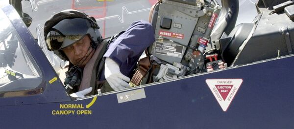Chief of Indian Air Force Air Chief marshal SP Tyagi unfastens his seatbelt as he gets out of a BAE systems HAWK advanced jet trainer after flying it over the Yehlanka Air force Station on the outskirts of Bangalore on the eve of the Aero India 2005 aerospace show. (File) - Sputnik International