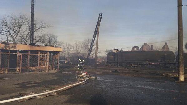 In this photo released by Bulgarian Interior Ministry, firefighters work at the scene of a train derailment following an explosion in the village of Hitrino in Bulgaria Saturday, Dec 10, 2016 - Sputnik International