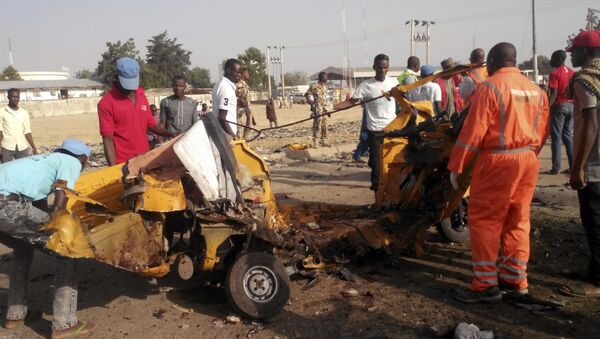 People clear debris after an explosion in Maiduguri, Nigeria (File) - Sputnik International