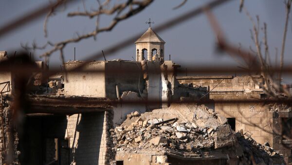 A part of a church is seen amid the damage in the government-controlled area of the Old City of Aleppo, Syria December 10, 2016 - Sputnik International
