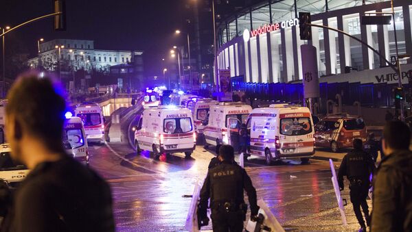 Police officers and ambulances fill the street next to the Besiktas football club stadium, in Istanbul, late Saturday, Dec. 10, 2016. Two loud explosions have been heard near the newly built soccer stadium and witnesses at the scene said gunfire could be heard in what appeared to have been an armed attack on police.Turkish authorities have banned distribution of images relating to the Istanbul explosions within Turkey. - Sputnik International