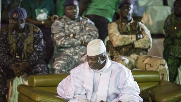 Incumbent Gambian President Yahya Jammeh looks on in Banjul on November 29, 2016, during the closing rally of the electoral campaign of the Alliance for Patriotic Reorientation and Construction (APRC) - Sputnik International