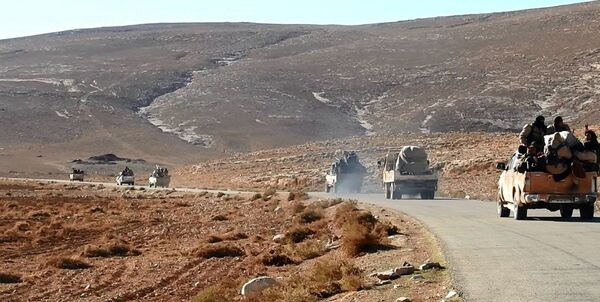This image posted online on Saturday, Dec. 10, 2016, by supporters of the Islamic State militant group on an anonymous photo sharing website, purports to show a convoy of Daesh vehicles driving in a desert area of east of Palmyra city, in Homs, Syria This image posted online on Saturday, Dec. 10, 2016, by supporters of the Islamic State militant group on an anonymous photo sharing website, purports to show a convoy of Daesh vehicles driving in a desert area of east of Palmyra city, in Homs, Syria - Sputnik International