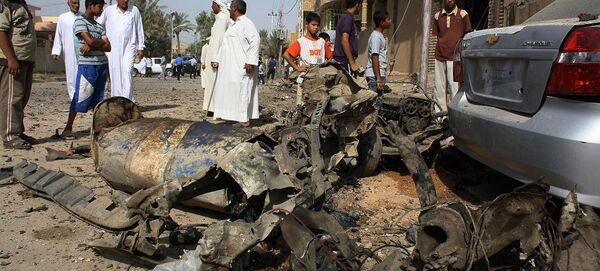 Wreckage of a car after a car bomb exploded in the former insurgent stronghold of Fallujah (File) Wreckage of a car after a car bomb exploded in the former insurgent stronghold of Fallujah (File) - Sputnik International