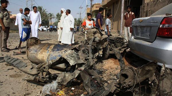 Wreckage of a car after a car bomb exploded in the former insurgent stronghold of Fallujah (File) - Sputnik International