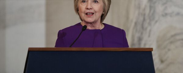 Former Secretary of State Hillary Clinton speaks during a ceremony to unveil a portrait of Senate Minority Leader Harry Reid, D-Nev., on Capitol Hill, Thursday, Dec. 8, 2016, in Washington Former Secretary of State Hillary Clinton speaks during a ceremony to unveil a portrait of Senate Minority Leader Harry Reid, D-Nev., on Capitol Hill, Thursday, Dec. 8, 2016, in Washington - Sputnik International