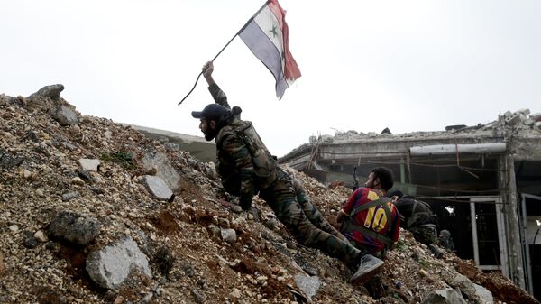 Syrian army soldier places a Syrian national flag during a battle with rebel fighters at the Ramouseh front line, east of Aleppo, Syria - Sputnik International