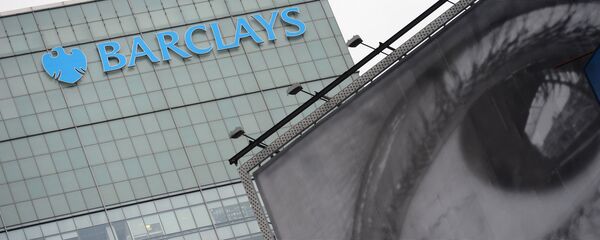Barclays' bank logo is seen above a billboard displaying art photography in New York, June 11, 2013 - Sputnik International