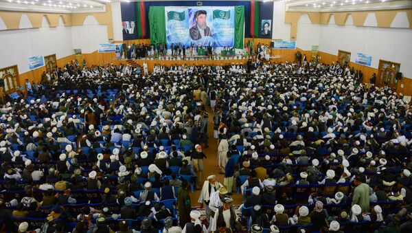 Supporters of Gulbuddin Hekmatyar, the leader of Hizb-i-Islami, attend a gathering in Herat on October 5, 2016 - Sputnik International
