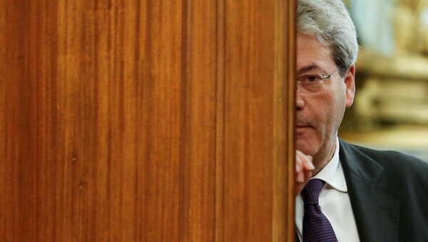 Italian Prime Minister-designate Paolo Gentiloni leaves at the end of a meeting at the Low Chamber in Rome, Italy December 12, 2016. - Sputnik International