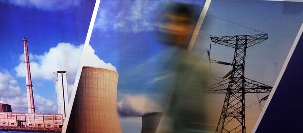 A delegate of the India Nuclear Energy 2011 summit walks past a stall in Mumbai on September 29, 2011 A delegate of the India Nuclear Energy 2011 summit walks past a stall in Mumbai on September 29, 2011 - Sputnik International