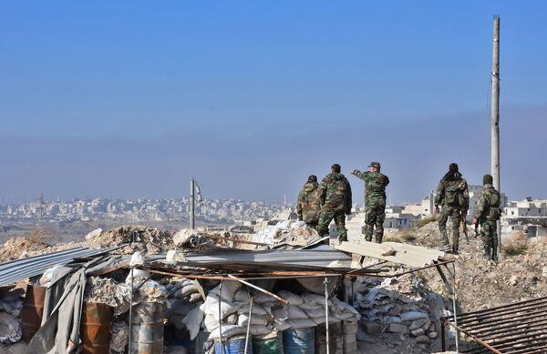 Syrian pro-government forces patrol Aleppo's Sheikh Saeed district, on December 12, 2016, after troops retook the area from rebel fighters Syrian pro-government forces patrol Aleppo's Sheikh Saeed district, on December 12, 2016, after troops retook the area from rebel fighters - Sputnik International