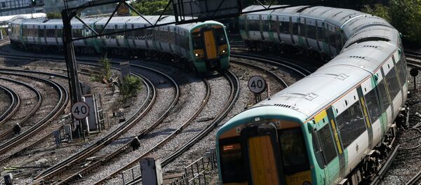 Southern Rail passenger trains arrive at Victoria Station in London on September 7, 2016 Southern Rail passenger trains arrive at Victoria Station in London on September 7, 2016 - Sputnik International