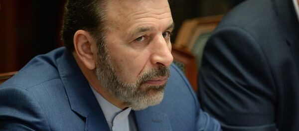 Minister of Information and Communications Technology of Iran Mahmoud Vaezi (L) - Sputnik International