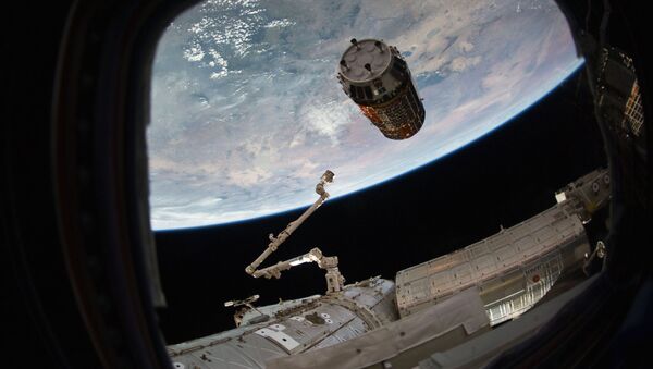 This photo provided by NASA TV shows a Japanese cargo ship before it arrives with Christmas gifts to the International Space Station on Tuesday, Dec. 13, 2016 - Sputnik International